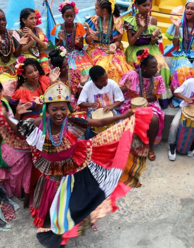 Young Congo group dancing and playing the drum during the Congo's Pollera Festival in Portobelo