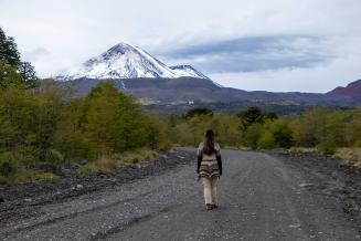 Camila Jara Quilapan, against the backdrop of the Llaima Volcano, one of the largest and most active volcanoes in Chile.