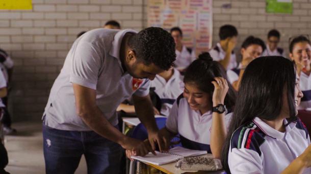 teacher in classroom in colombia