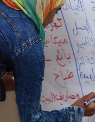 woman writing arabic