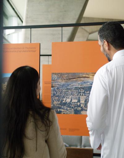 Conference participants at the AlUla exhibition in UNESCO