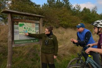 A park ranger gives a thematic tour to visitors, Drömling Biosphere Reserve, Germany