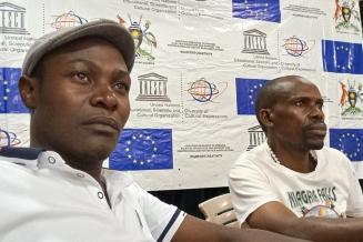 Mzee Bwanika - Executive Secretary of Pearlwood (left) and VJ Ronnie - Secretary General of the Video Jockeys Guild (right)