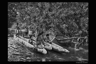 Asmat women fishing, image by Sebastião SALGADO