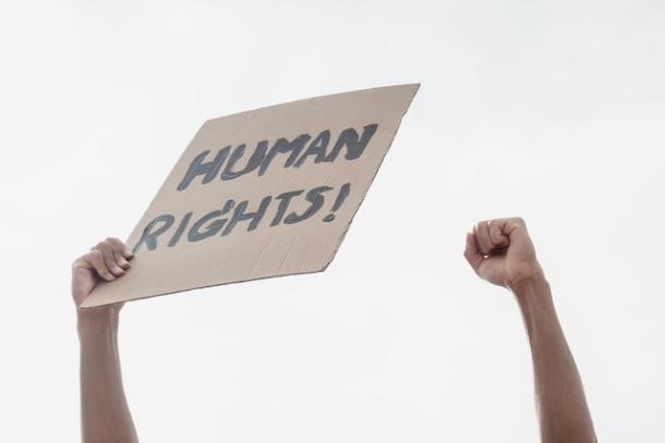 Person Holding a Human Rights Placard